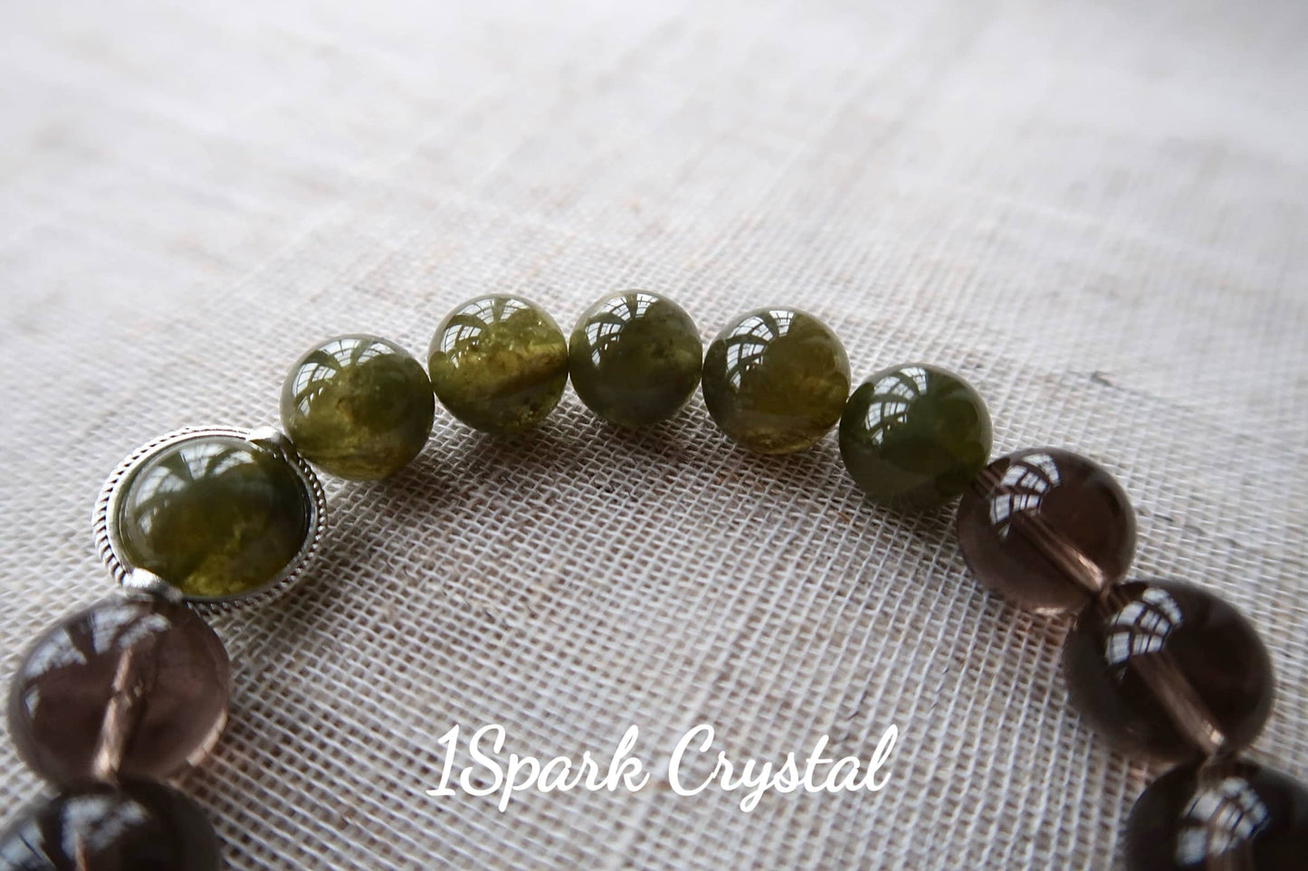 Close-up of Healthy Glow bracelet showcasing the deep, warm hues of smoky quartz, emphasizing its grounding and protective qualities