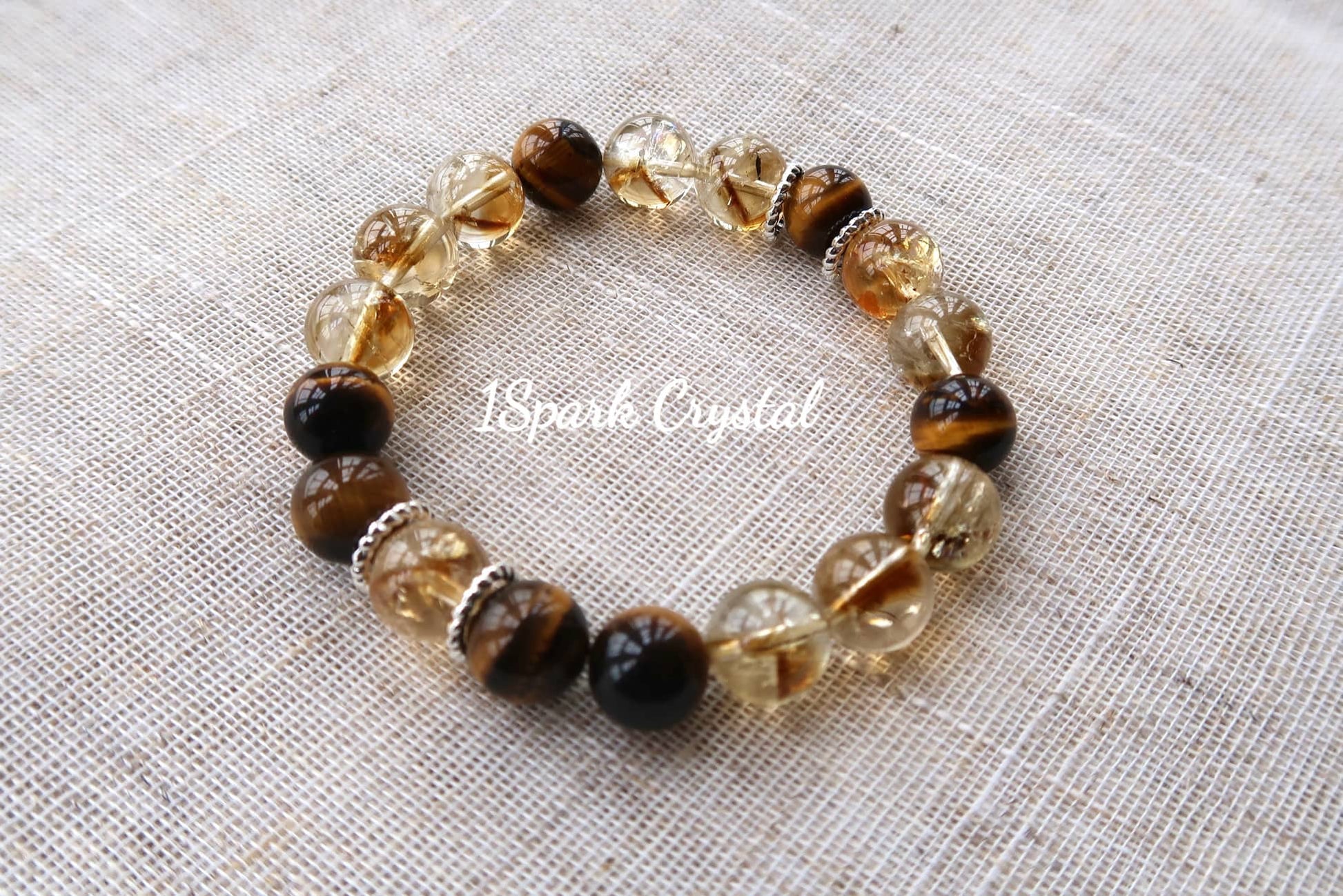 Full view of the Money Magnet bracelet, highlighting the bright yellow citrine and the golden hues of tiger’s eye, symbolizing prosperity, abundance, and good fortune