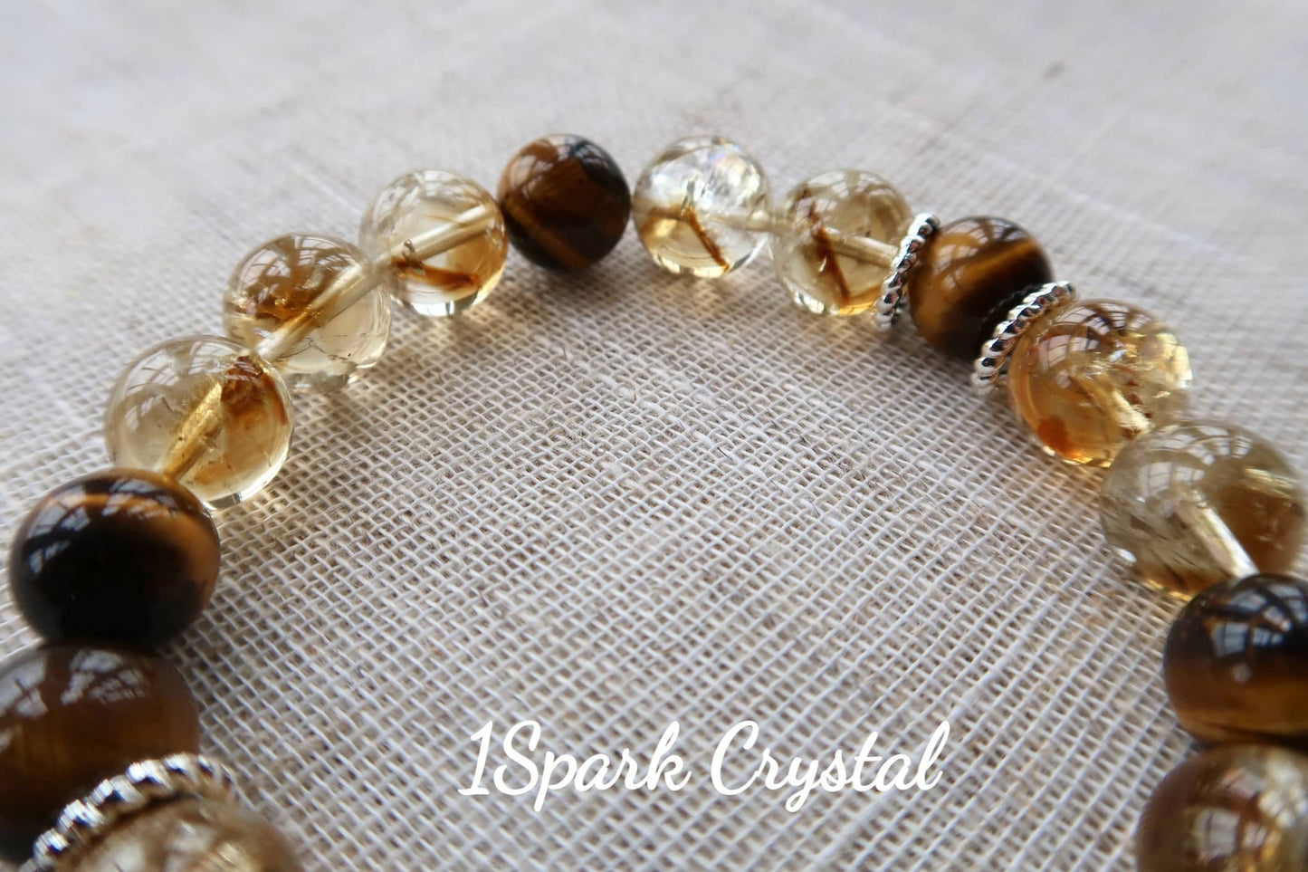 Money Magnet crystal bracelet with citrine and golden tiger’s eye, reflecting light to emphasize the bracelet’s powerful energy for wealth attraction