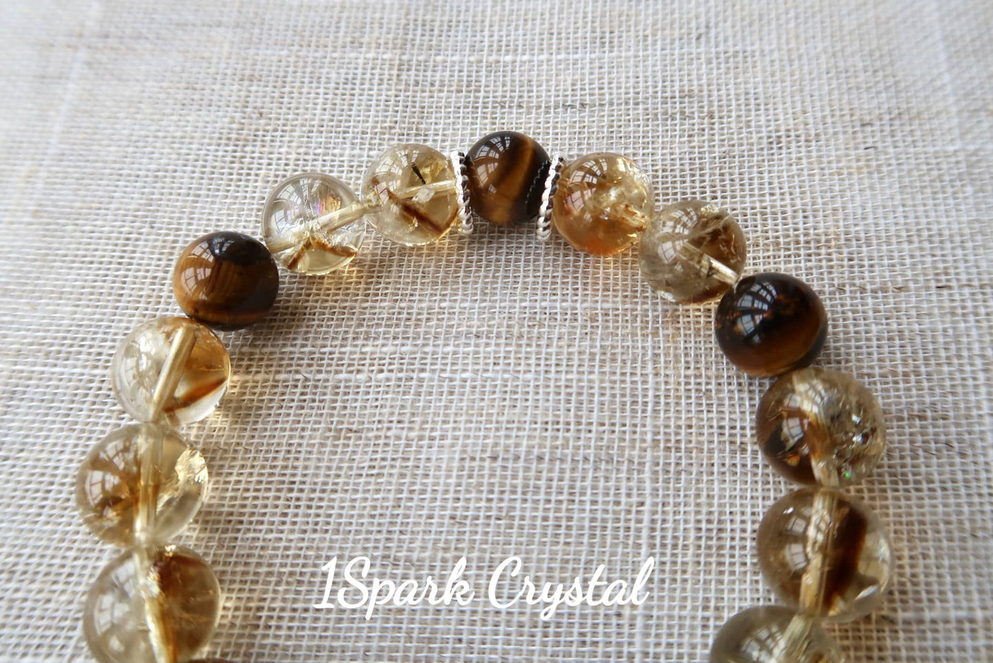 Detailed close-up of Money Magnet bracelet highlighting the golden sheen of tiger’s eye crystals, promoting strength, confidence, and financial growth