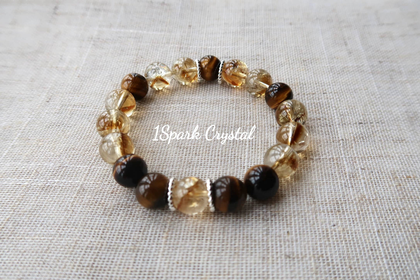 Detailed close-up of Money Magnet bracelet highlighting the golden sheen of tiger’s eye crystals, promoting strength, confidence, and financial growth